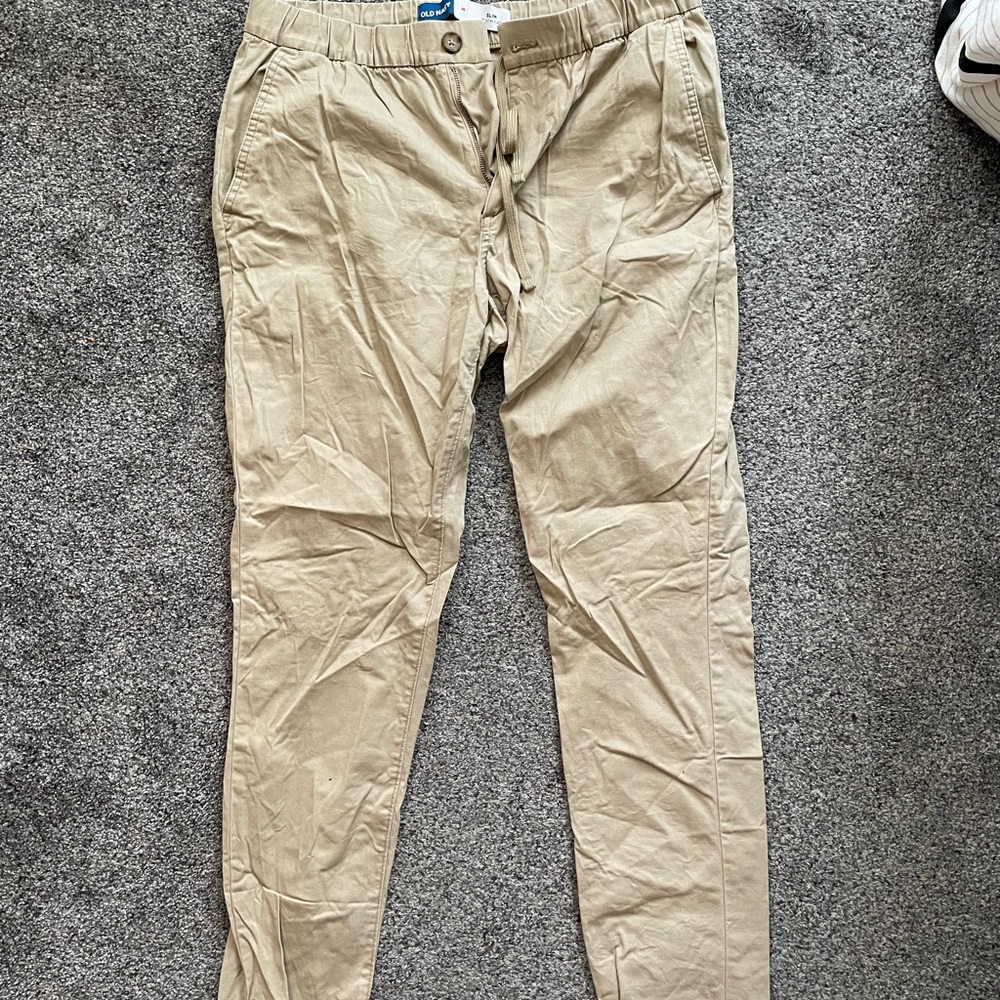 Slim Old Navy, medium khaki pants with button and drawstring.